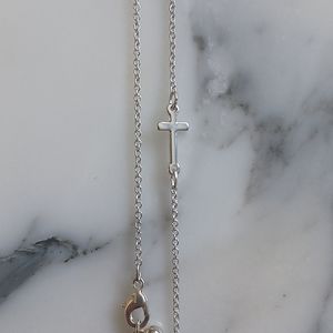 Dainty sideways cross necklace